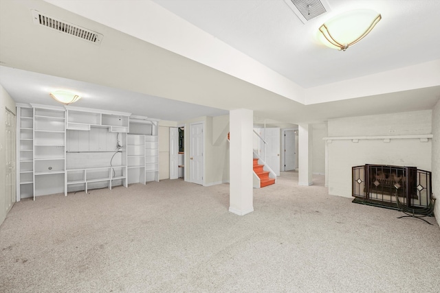 basement featuring carpet flooring