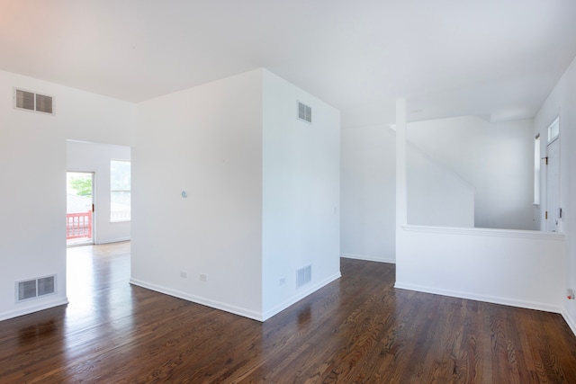 empty room featuring dark hardwood / wood-style floors