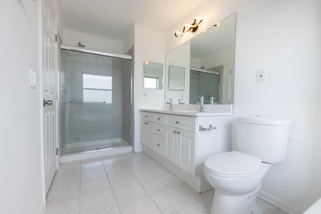 bathroom with walk in shower, tile patterned flooring, vanity, and toilet