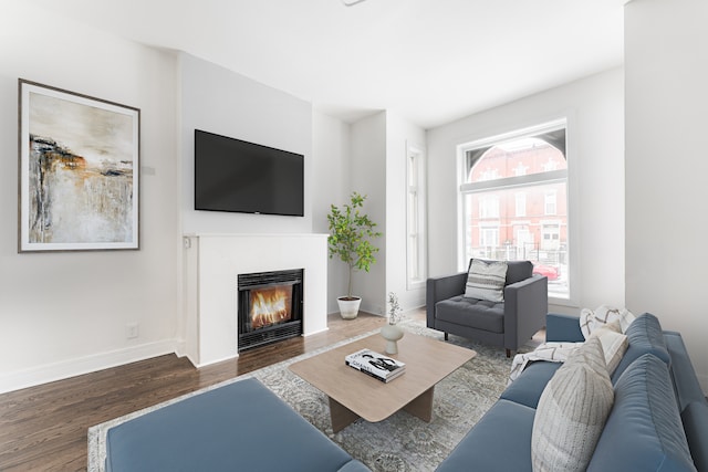 living room with dark hardwood / wood-style floors