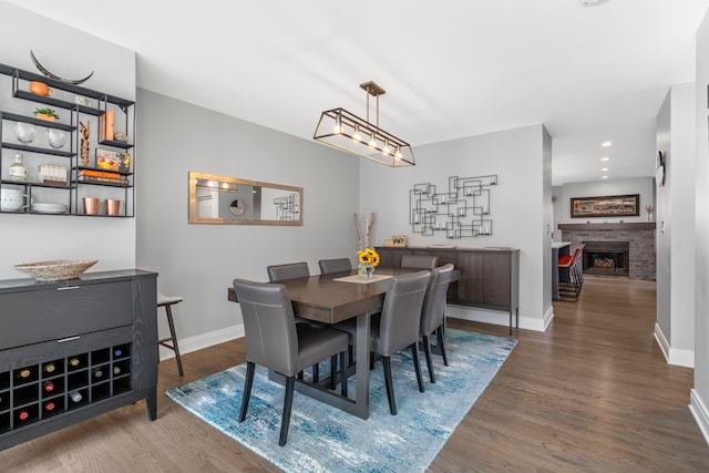 dining room with hardwood / wood-style flooring