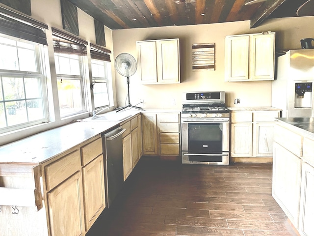 kitchen featuring appliances with stainless steel finishes, wood ceiling, sink, beam ceiling, and dark hardwood / wood-style floors