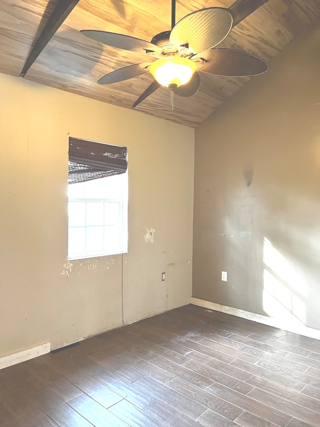 spare room with ceiling fan, wooden ceiling, and dark hardwood / wood-style floors