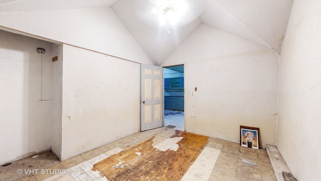 bathroom with vaulted ceiling