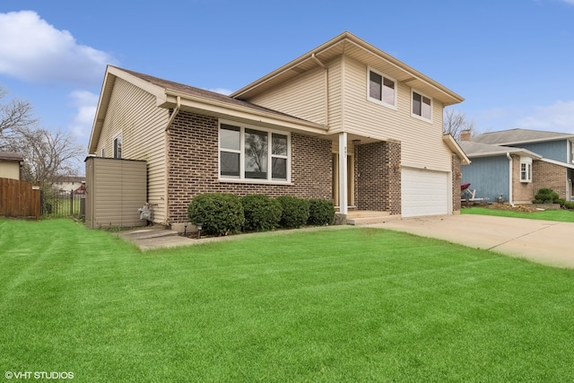 view of front facade featuring a garage and a front yard