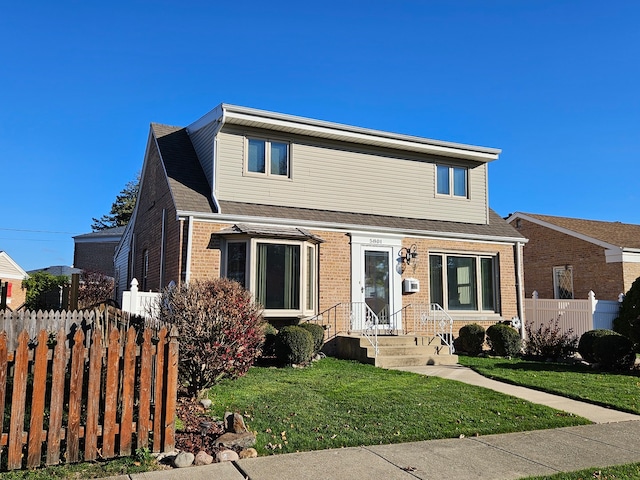 view of front facade with a front lawn