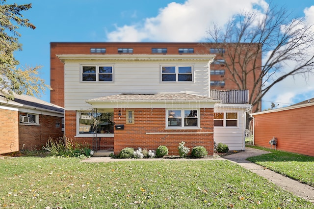 view of front property with cooling unit and a front lawn