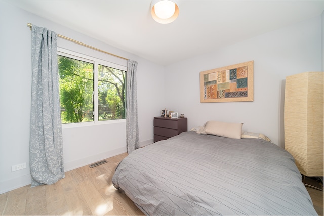 bedroom featuring light hardwood / wood-style flooring