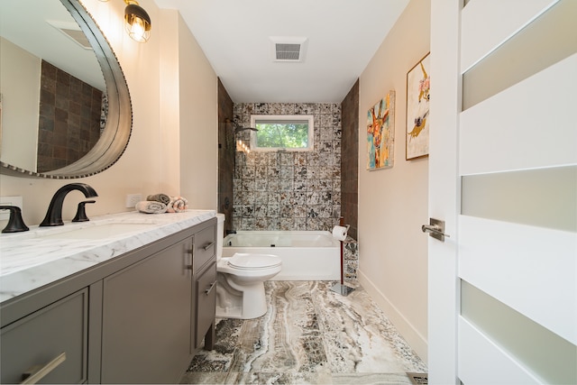 full bathroom with tiled shower / bath, toilet, and vanity