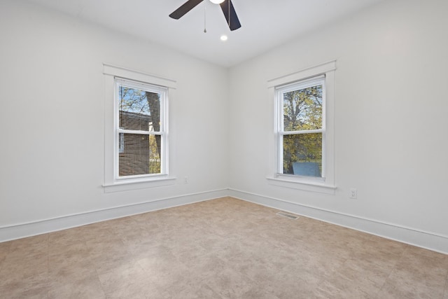 spare room featuring ceiling fan