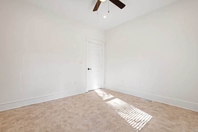 unfurnished room featuring ceiling fan