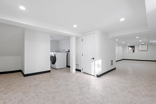 washroom with washer / clothes dryer and light colored carpet