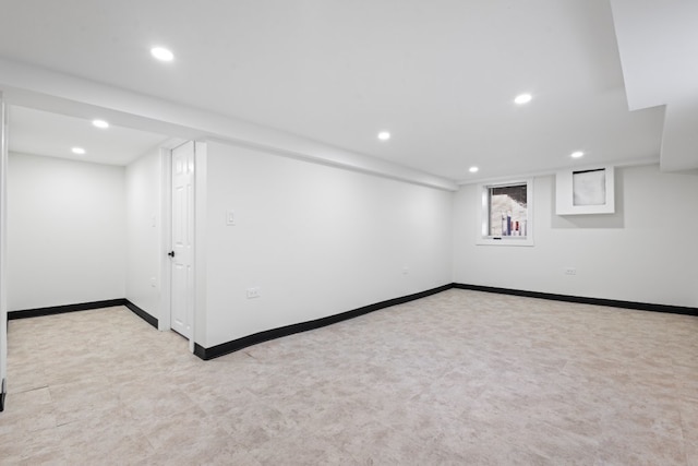 basement with light colored carpet