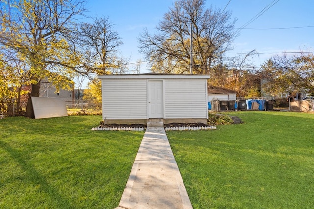 view of outdoor structure with a yard