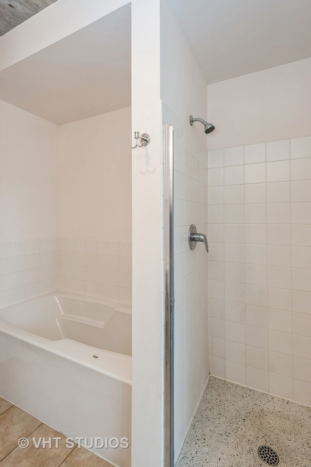 bathroom with independent shower and bath