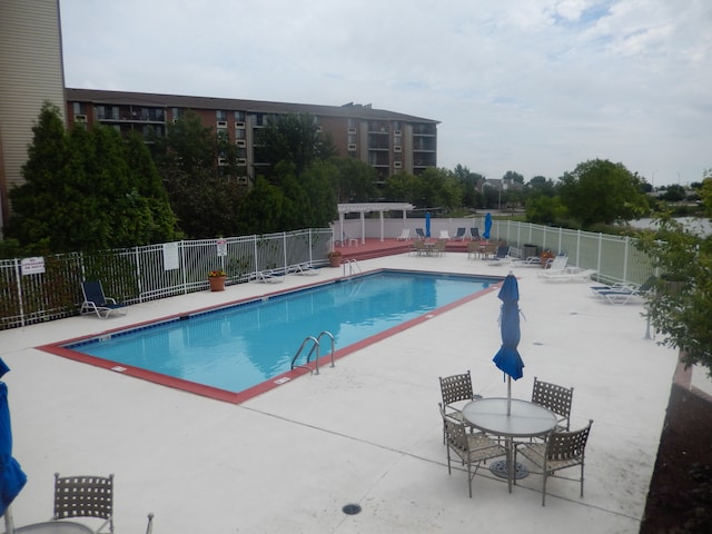 view of pool with a patio