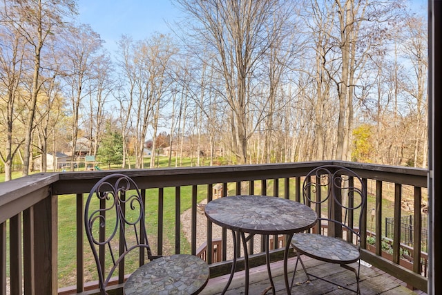 deck featuring a lawn