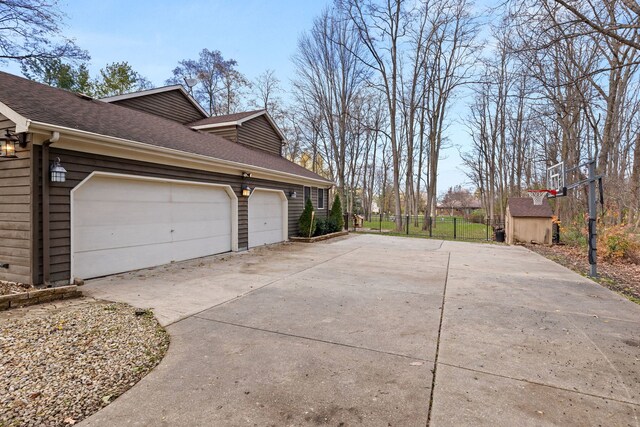 back of property with a sunroom, a balcony, a patio area, and a lawn