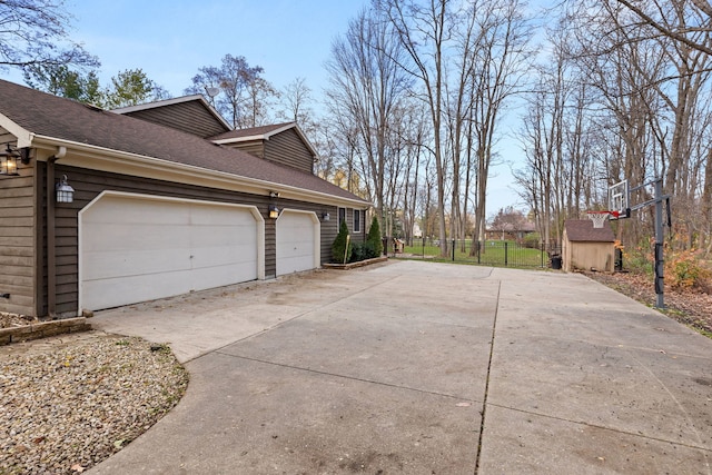 view of property exterior with a garage