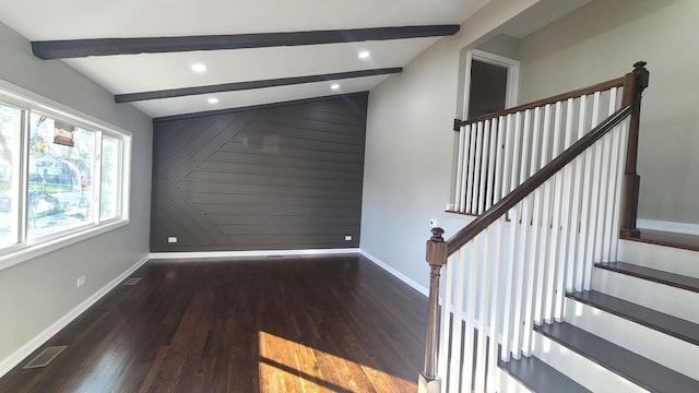 interior space featuring vaulted ceiling with beams and hardwood / wood-style floors