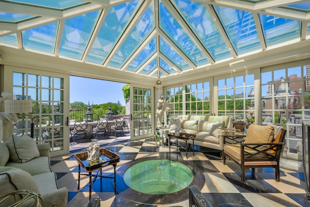 sunroom with vaulted ceiling and plenty of natural light