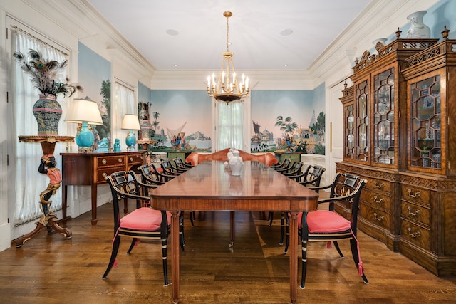 dining area with an inviting chandelier, wood-type flooring, and crown molding