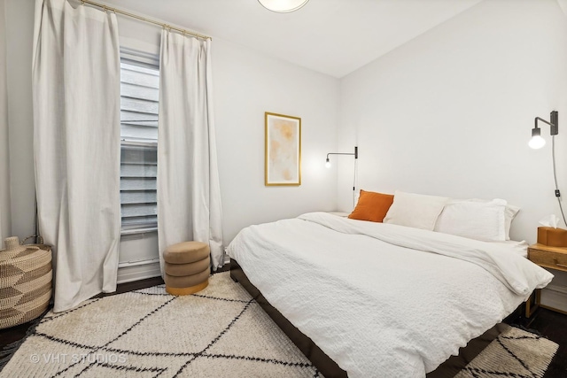 bedroom featuring wood-type flooring