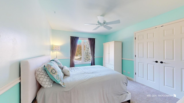 bedroom with carpet floors, ceiling fan, and a closet