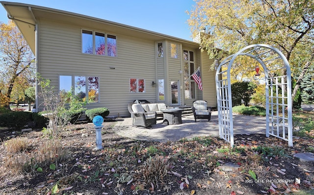 back of house with a patio and an outdoor hangout area