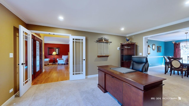 office space with french doors, crown molding, light carpet, and a notable chandelier