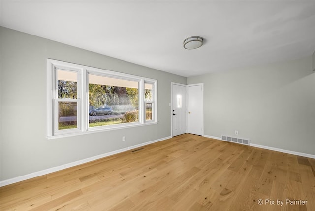 empty room featuring light wood-type flooring