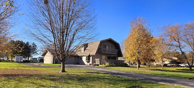 view of home's exterior with a lawn