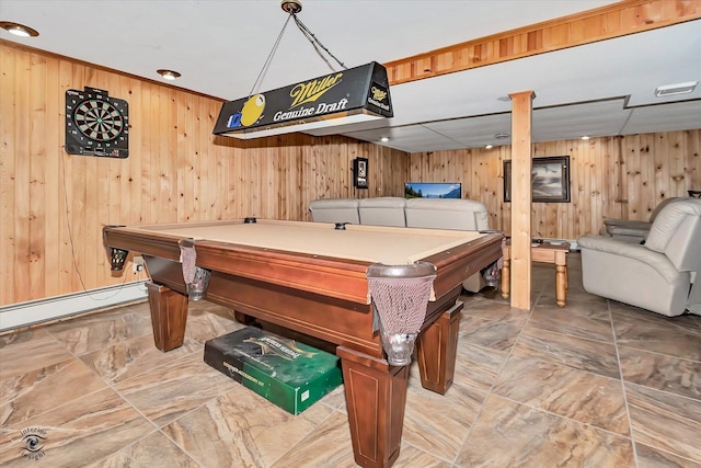 game room with wooden walls and pool table