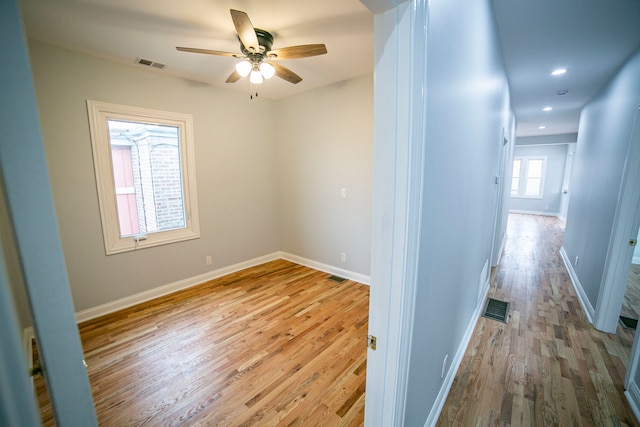 hallway featuring light hardwood / wood-style floors