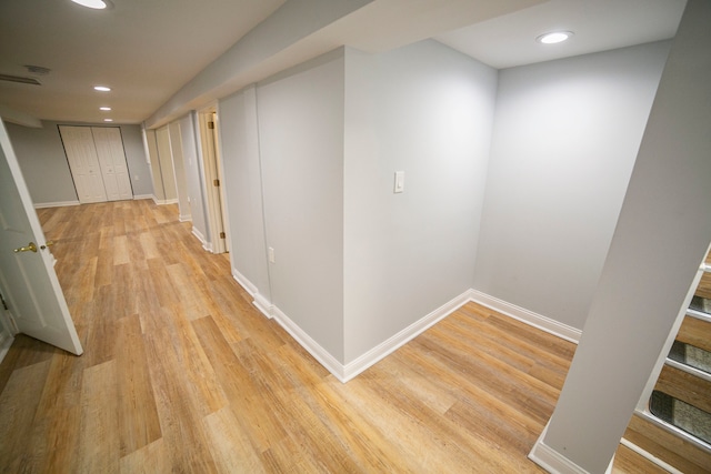 hallway featuring light wood-type flooring