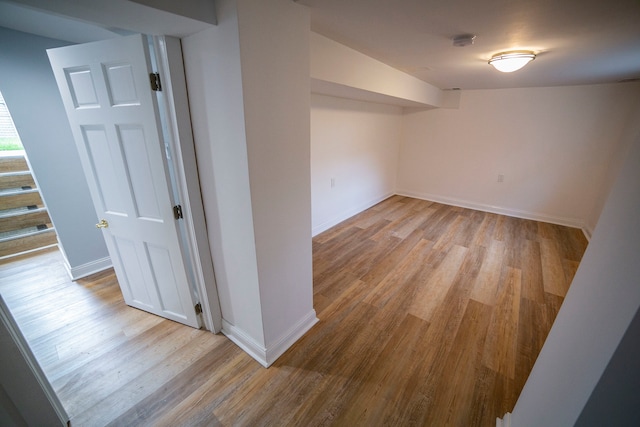 basement featuring light hardwood / wood-style flooring