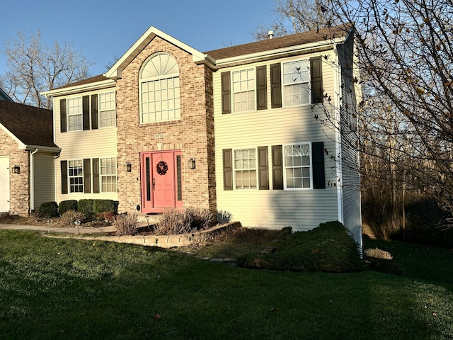 view of front of home with a front yard