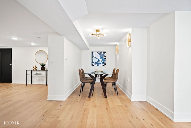 dining space featuring baseboards, recessed lighting, and light wood-style floors