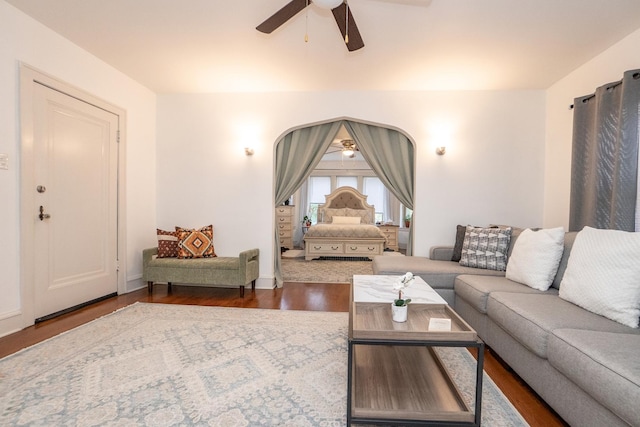 living room with ceiling fan and hardwood / wood-style floors