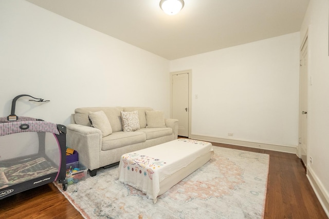 living room with dark wood-type flooring