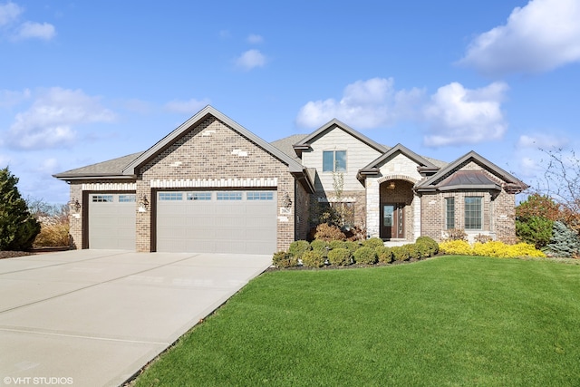 view of front of house with a front lawn and a garage