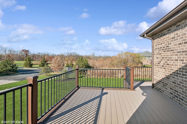 deck featuring a lawn