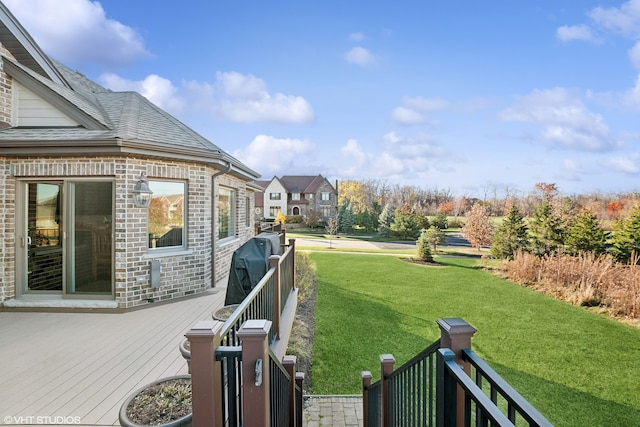 view of yard featuring a wooden deck