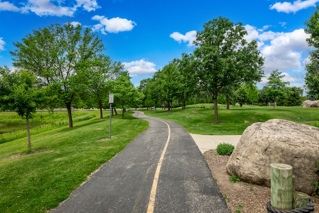 surrounding community with a lawn