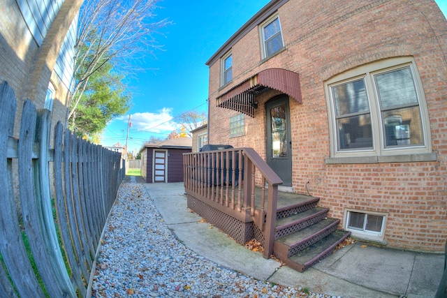 entrance to property featuring a deck