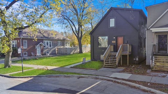 view of front of home with a front yard