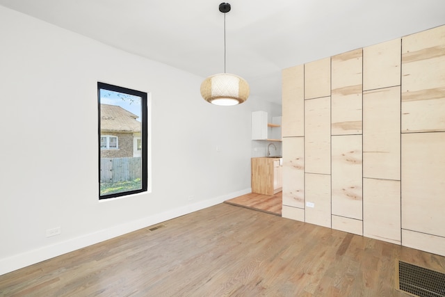 interior space featuring sink and hardwood / wood-style floors