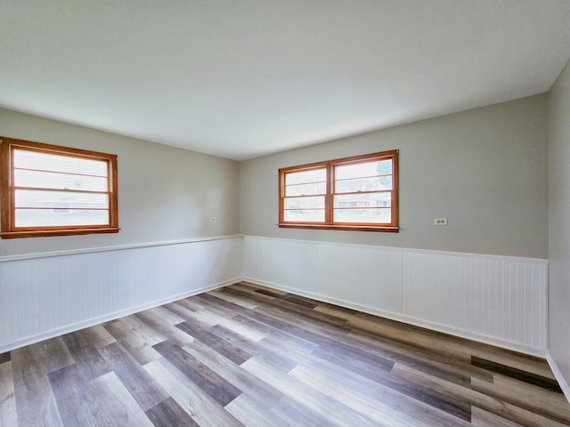 empty room with wood-type flooring