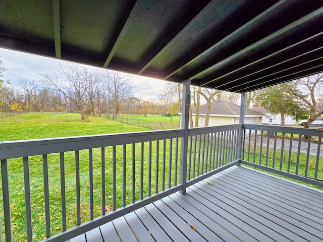 wooden deck with a yard