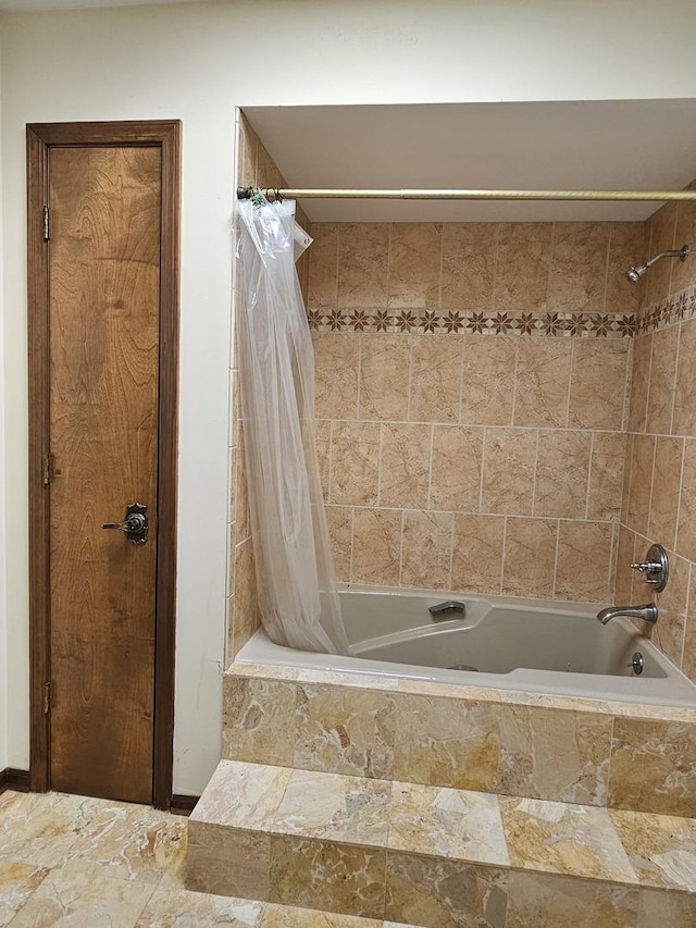 full bath featuring tiled shower / bath combo